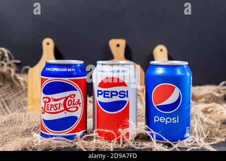 Tyumen, Russia-November 01, 2020: Cans of Pepsi in a retro rustic style. owned by the American company PepsiCo. Stock Photo