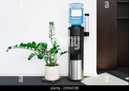 Large water dispenser in the office, with cold and hot taps Stock Photo -  Alamy