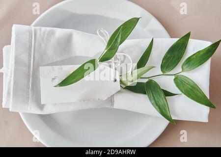 Decoration of plates at a wedding celebration. wedding decorations. Stock Photo