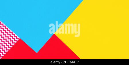 Abstract geometric fashion papers texture background in yellow, light pink, blue colors. Top view, flat lay Stock Photo