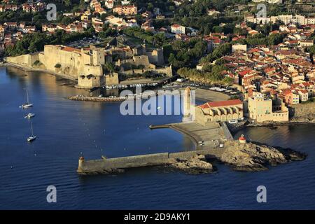 Collioure (south of France): aerial view of the bay and the city from the sea at dawn. Stock Photo