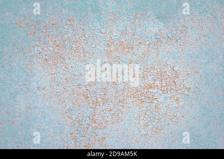 Abstract background orange rust on turquoise painted metal surface. Corroded metal background. Stock Photo