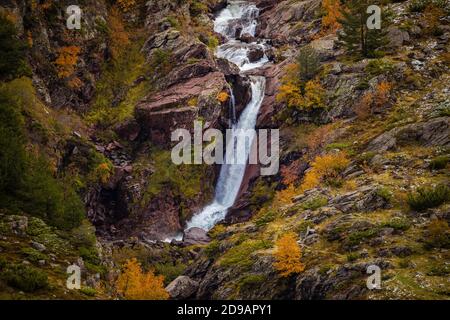 Cascade of cold and icy water from the Aragon Subordan River, near its source. Aragonese Pyrenees, near of Aguas Tuertas valley, Hecho and Anso, Huesc Stock Photo