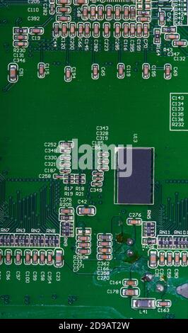 Old green circuit board close-up Stock Photo