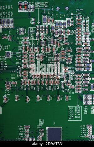 Old green circuit board close-up Stock Photo