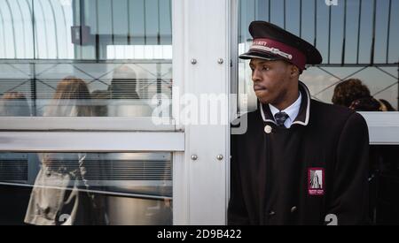 NEW YORK, USA - Apr 30, 2016: Security guard on the observation deck of the Empire State Building in New York City Stock Photo