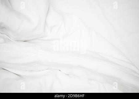 Linel wrinkled bed. White wrinkles bedding sheets Stock Photo