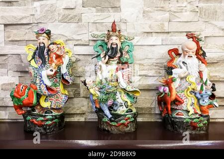 Chinese Fu Lu Shou or God of Prosperity, Happiness, Longevity Stock Photo