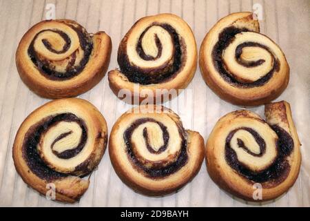 A close up of home baked cinnamon rolls ready for icing Stock Photo