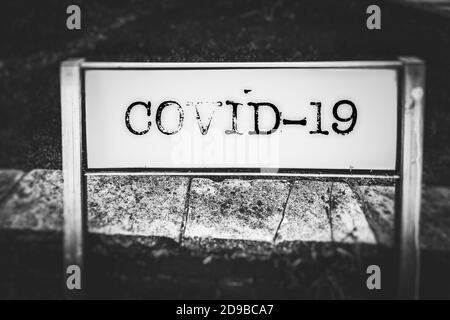 COVID-19 on a road sign Stock Photo
