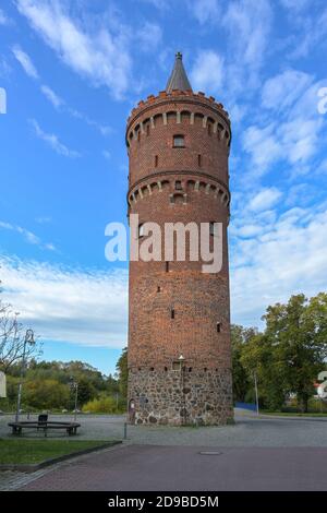 Round medieval fortified tower built of brick in Friedland (Mecklenburg-Vorpommern) called Fangelturm, formerly part of the city wall that surrounded Stock Photo