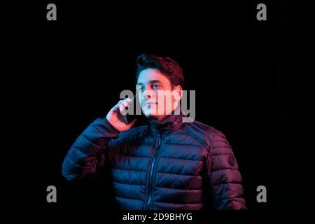 The guy is talking on his phone. Stock Photo