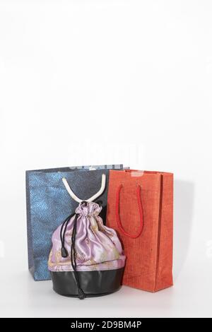 Colorful paper bags and gift boxes and pouch Stock Photo