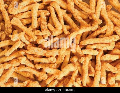 SNACKS STICKS CORN, isolated Image kurkure or namkeen sticks, background image. Stock Photo