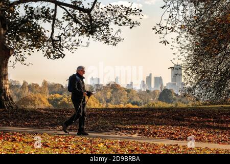 People enjoying Hampstead Heath in Autumn Stock Photo