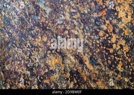 Marble Rusty Metal Wall, Old Iron Sheet, Covered With Rust With Multi-Colored Paint Stock Photo