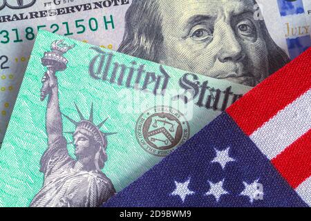 Untied States Flag with Tax Return Check and Hundred Dollar Bill. Stock Photo