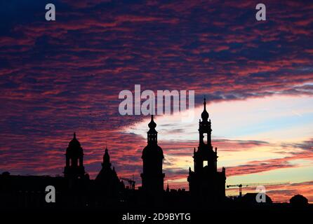 Dresden, Germany. 04th Nov, 2020. Sunset can be seen above the old town with the Ständehaus, the Georgentor, the Hausmannsturm and the Hofkirche. Credit: Robert Michael/dpa-Zentralbild/ZB/dpa/Alamy Live News Stock Photo