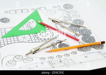 Working at landscape project management and planning a landscape design. Stock Photo