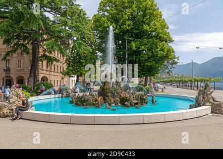 Lugano, Switzerland - June 14, 2019: Fountain Sculpture at Piazza Alessandro Manzoni in Lugano, Switzerland. Stock Photo