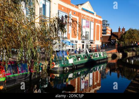Canal barges on the River Witham beside the Waterside Centre shopping Mall. Lincoln, Lincolnshire, England, United Kingdom. Stock Photo