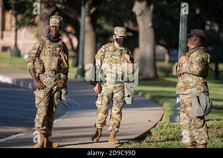 National Guard specialists guard the south gate of the Texas Capitol on the afternoon of November 3, 2020. The Guard was deployed to assist the Texas Department of Public Safety (DPS) in case of any election unrest tonight. Stock Photo