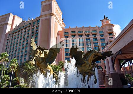 The main entrance to the Atlantis resort on Paradise Island, Bahamas. The Pegasus fountain with the Royal Tower, containing hotel rooms behind. Stock Photo