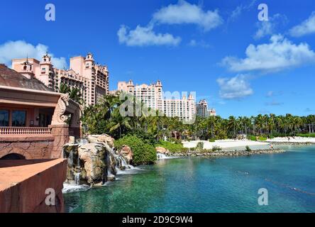 Atlantis Paradise Island, Bahamas.  The saltwater lagoon and beach in the luxury themed hotel and resort are seen on a sunny day with blue sky. Stock Photo