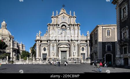 CATANIA, SICILY, ITALY - APRIL 05, 2010: people crowding main square of Cathedral in Catania Old Town, one of most important city of Sicily tourism Stock Photo