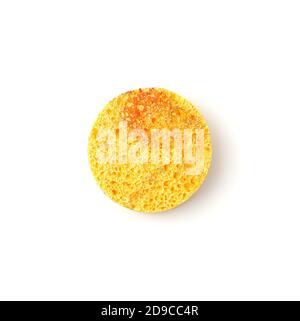 Yellow, round sponge for skin cleansing is isolated on a white background. Stock Photo