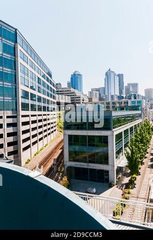 Elevated view southeast on Alaskan Way around Pier 70 in Belltown in Seattle, Washington, including World Trade Center West building. Stock Photo