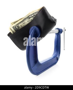 Tight Budget — isolated vice grip with crushed money wallet on a white background. Stock Photo