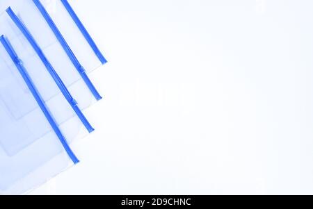 Plastic transparent zipper bags on soft light background Stock Photo