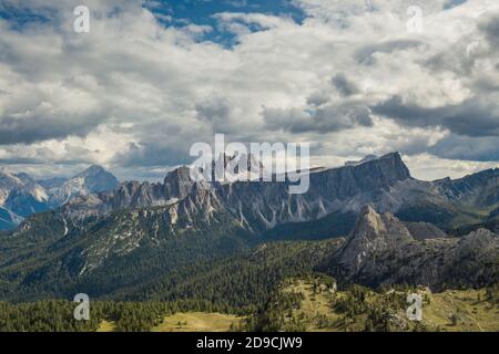 A picture of Mount Croda da Lago under a blue sky with clouds in Cortina D'ampezzo, famous ski resort in the Dolomites Stock Photo