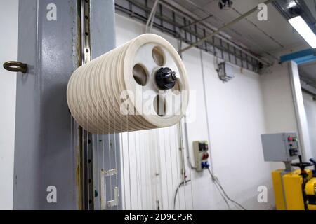 Extrusion on production line of 3D printing filament polymer Stock Photo