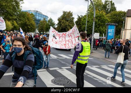 Gottingen, Germany. Autumn 2020. Fridays for future. Group of people marching with banners against climate change. Stock Photo