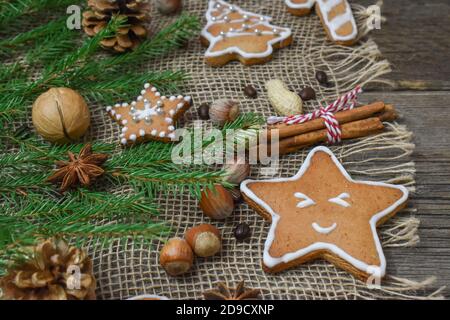A close-up of Christmas cookies and nuts has room for text. Stock Photo