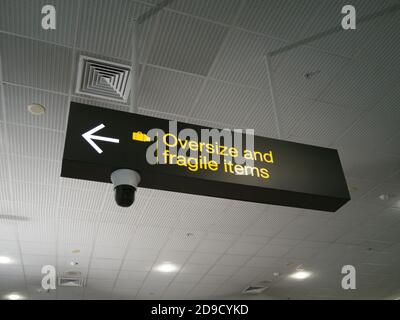 AUCKLAND, NEW ZEALAND - Oct 31, 2019: Auckland / New Zealand - October 31 2019: View of Oversize and fragile items sign in Auckland International Airp Stock Photo