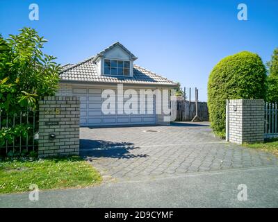 AUCKLAND, NEW ZEALAND - Nov 07, 2019: Auckland / New Zealand - November 5 2019: View of garage with loft attached to suburban house Stock Photo