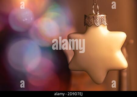 multicolored christmas card with ornament and christmas ball with blurred bokeh background Stock Photo