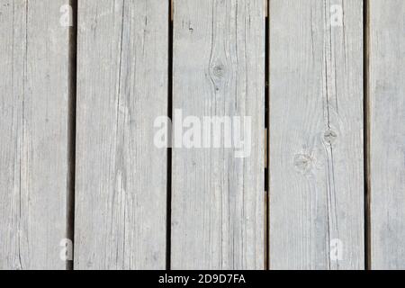 Texture of natural wood of light species from vertical boards, background. Stock Photo