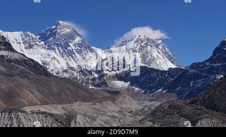 Beautiful panorama view of majestic Mount Everest (also Sagarmatha) including South Col and Hillary Step with rock-covered Ngozumpa glacier in Nepal. Stock Photo