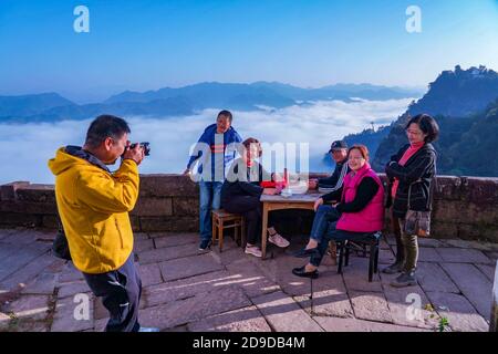 The beautiful scenery of the sea of clouds, which attracts many tourists in Huangshan city, east China's Anhui province, 20 October 2020. Stock Photo