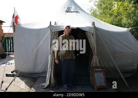 Portrait of nurse in a tent hospital Stock Photo