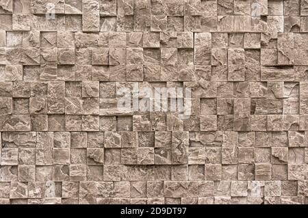 White cream marble stone limestone brick tile wall surface aged texture detailed pattern background Stock Photo