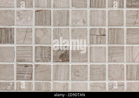 White or gray ceramic wall and floor tiles abstract background. Stock Photo