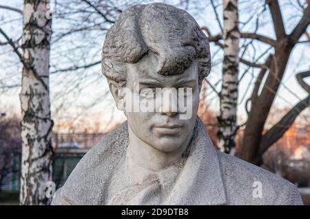 Moscow, Russia - March 24, 2020: Monument to the great Russian poet Sergey Yesenin on the background of birch trees Stock Photo