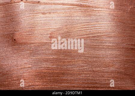 Red copper background texture with particles like scratches. Brush painted surface. Copper red gold pattern background. Stock Photo