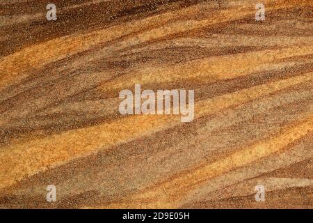 Abstract brown pattern on a grainy wall Stock Photo
