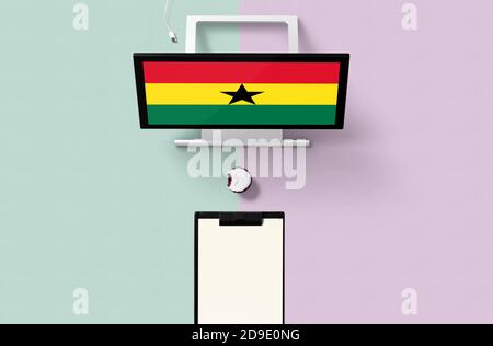 Ghana national flag on computer screen top view, cupcake and empty note paper for planning. Minimal concept with turquoise and purple background. Stock Photo